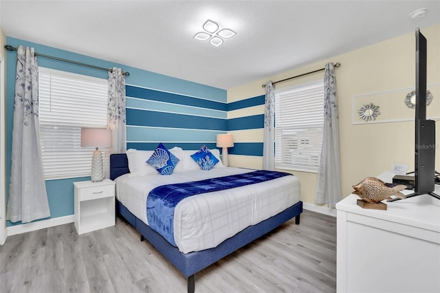 bedroom featuring light hardwood / wood-style flooring