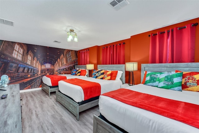 bedroom featuring light hardwood / wood-style floors