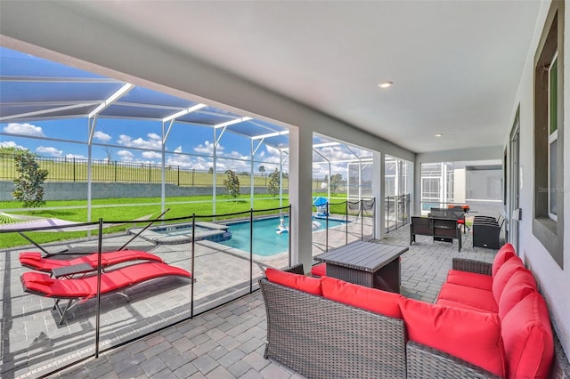 sunroom featuring lofted ceiling and a pool