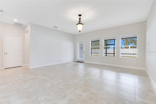 view of tiled empty room