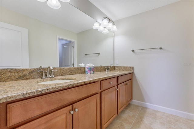 bathroom with vanity and tile patterned floors