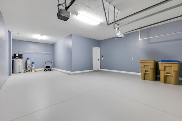 garage featuring a garage door opener and water heater