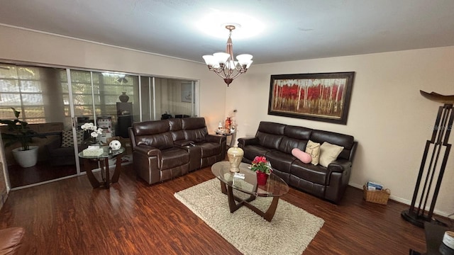 living room featuring dark hardwood / wood-style flooring and a chandelier