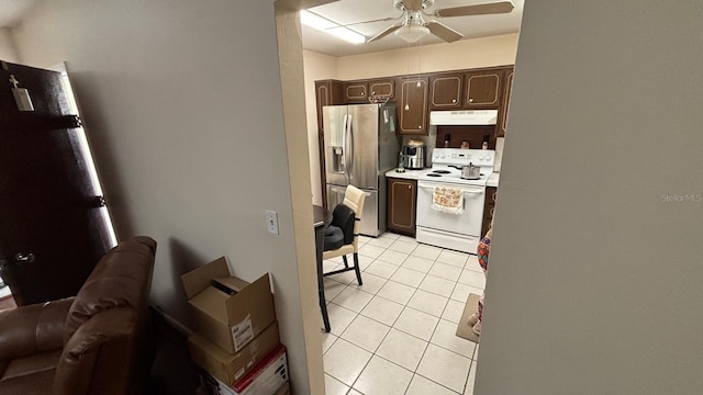 kitchen with ceiling fan, stainless steel fridge with ice dispenser, white electric stove, light tile patterned floors, and dark brown cabinets