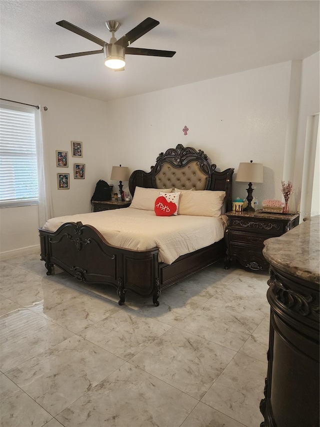 bedroom featuring ceiling fan