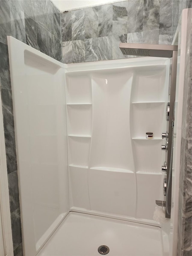 bathroom featuring walk in shower