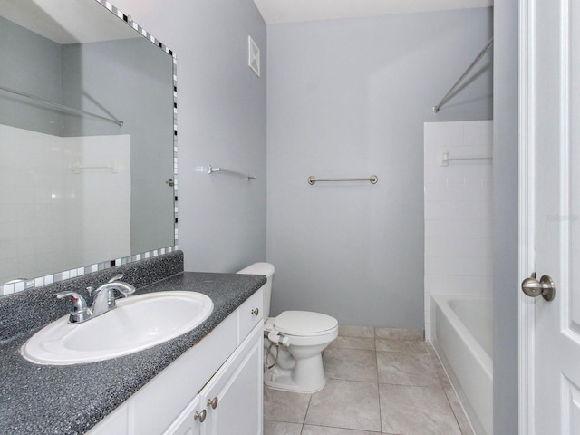 full bathroom with washtub / shower combination, vanity, tile patterned floors, and toilet