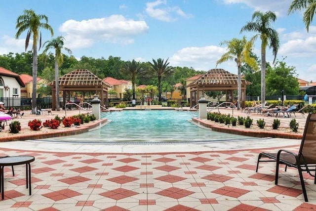 view of pool with a gazebo and a patio area