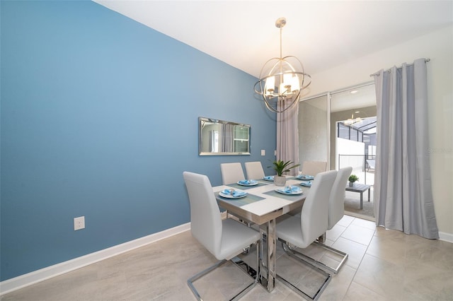 dining space featuring a chandelier and light tile patterned floors