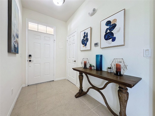 view of tiled entrance foyer