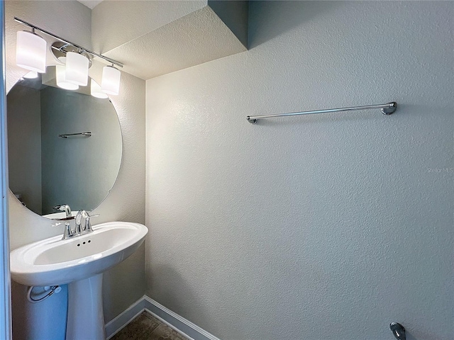 bathroom with a textured ceiling