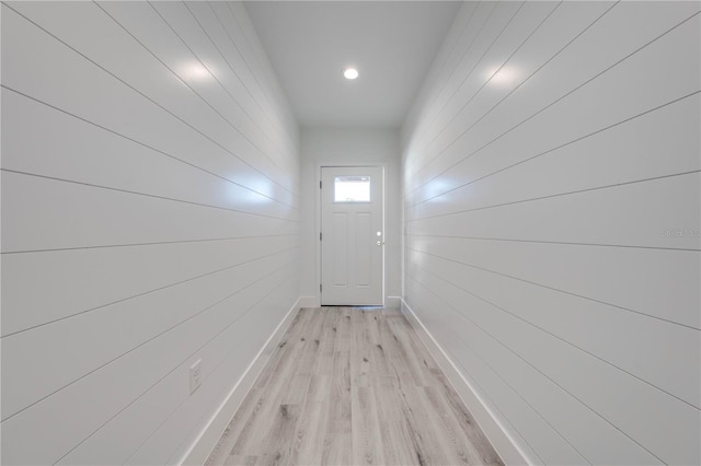 doorway to outside with light hardwood / wood-style floors