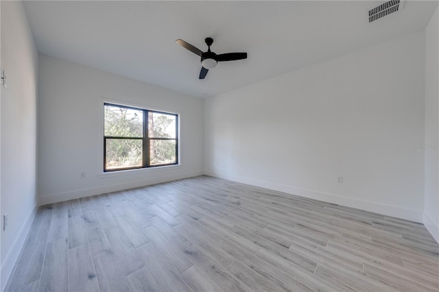 unfurnished room with ceiling fan and light hardwood / wood-style flooring