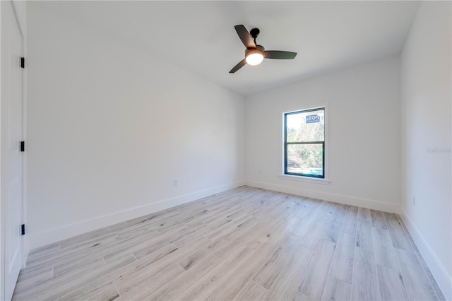 unfurnished room with ceiling fan and light hardwood / wood-style flooring