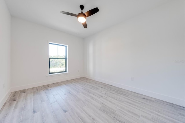 unfurnished room featuring light hardwood / wood-style floors and ceiling fan