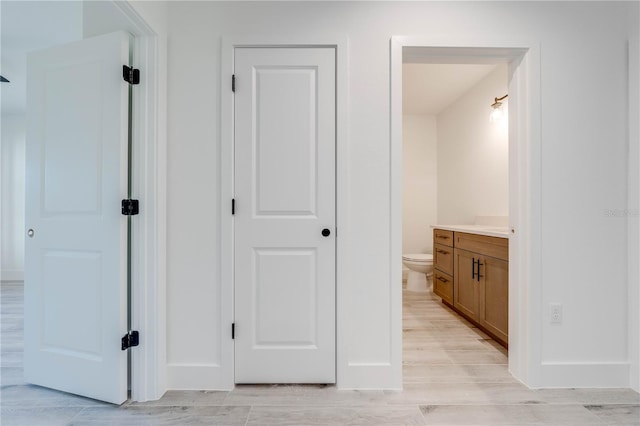 hall featuring light hardwood / wood-style flooring