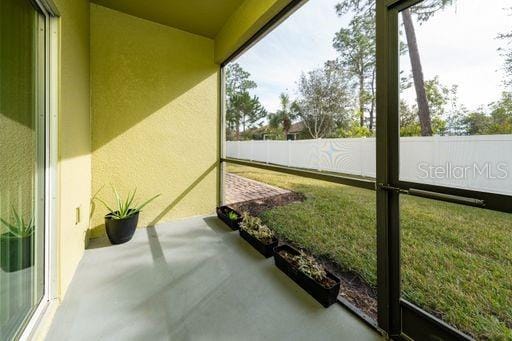 sunroom / solarium with a wealth of natural light