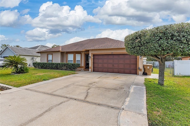 view of front facade featuring a garage and a front yard