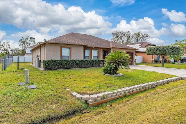 ranch-style house with a garage and a front lawn