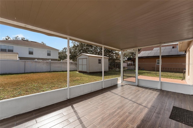 unfurnished sunroom with wood ceiling