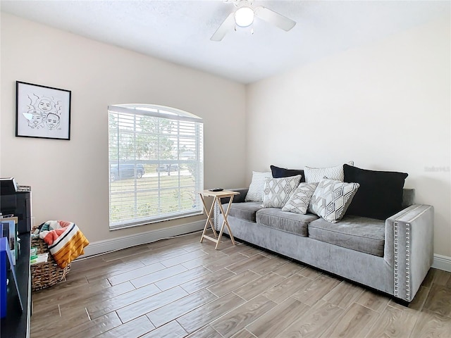 living room with ceiling fan