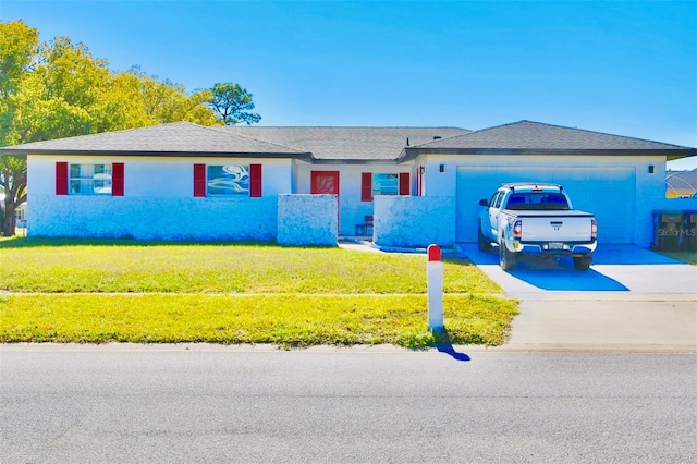 single story home with a front lawn and a garage