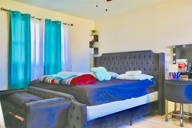 bedroom featuring hardwood / wood-style flooring