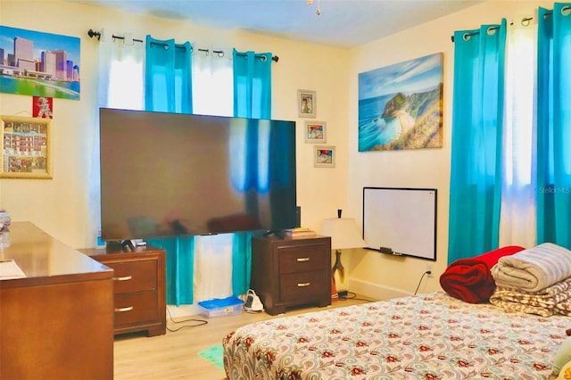 bedroom featuring light wood-type flooring