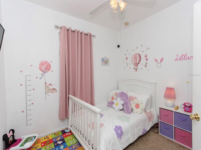 carpeted bedroom featuring ceiling fan