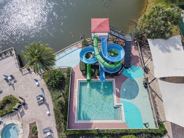 drone / aerial view featuring a water view