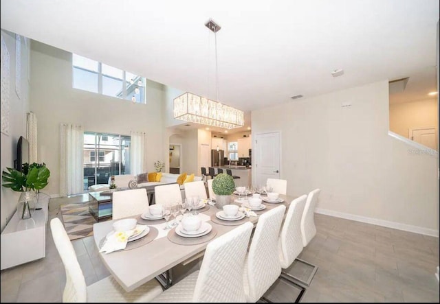 dining area featuring a chandelier