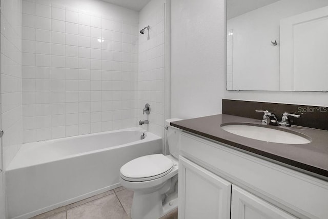 full bathroom featuring bathtub / shower combination, tile patterned floors, vanity, and toilet