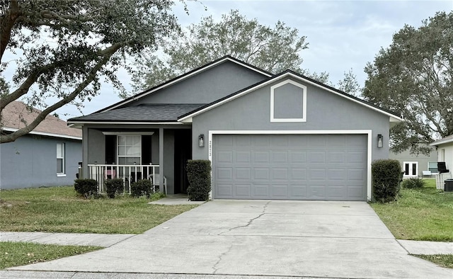 ranch-style house with a porch, an attached garage, driveway, stucco siding, and a front yard