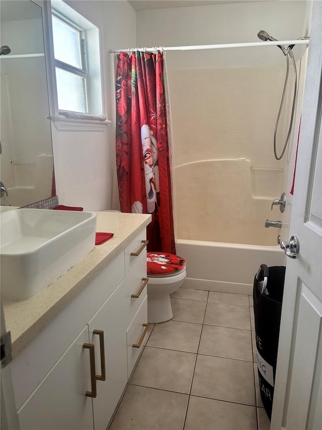 full bathroom featuring tile patterned flooring, shower / bath combination with curtain, vanity, and toilet