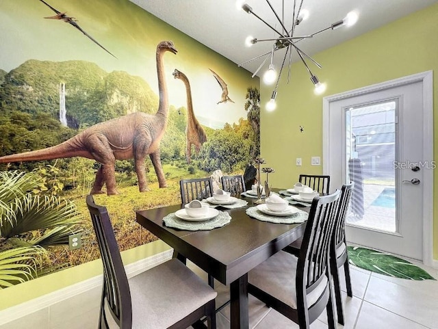 dining area with a notable chandelier and light tile patterned floors