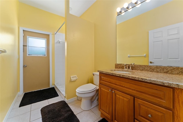 bathroom featuring toilet, tile patterned flooring, a shower, and vanity