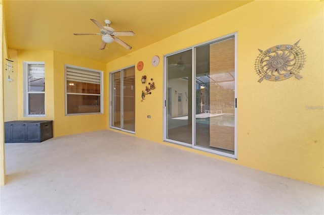 view of patio with ceiling fan