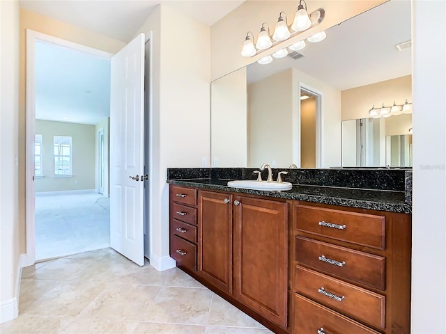 bathroom featuring tile patterned floors and vanity