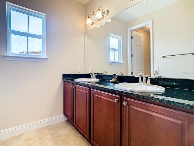 bathroom featuring vanity and tile patterned flooring