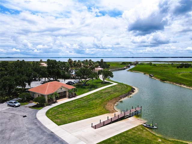 drone / aerial view with a water view