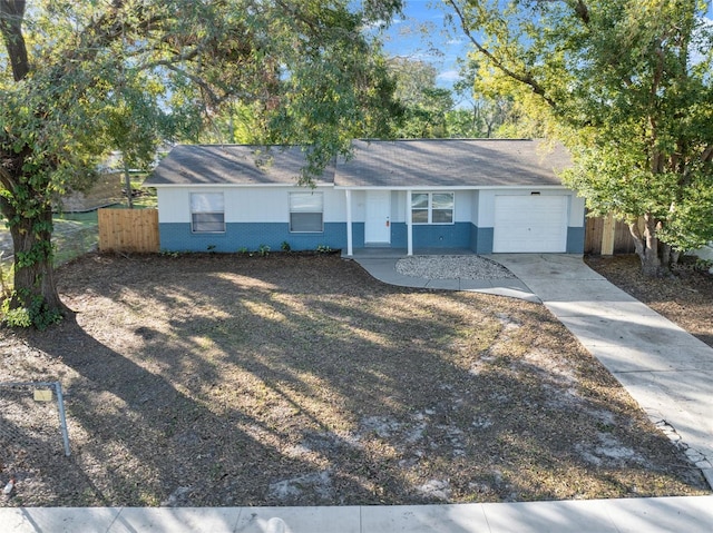 single story home with a garage