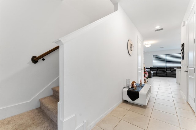 staircase with tile patterned flooring