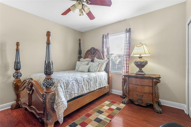 bedroom featuring dark hardwood / wood-style floors and ceiling fan