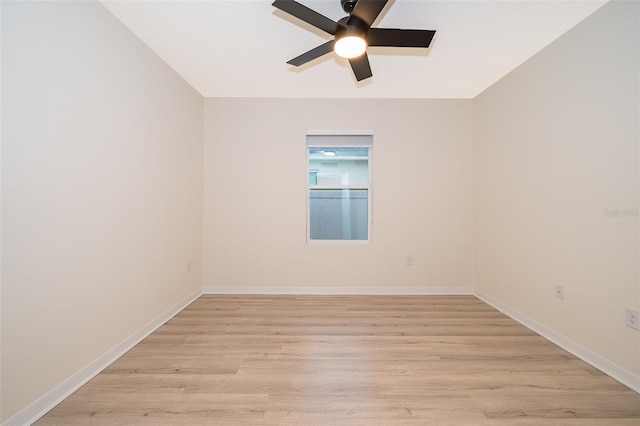 spare room featuring ceiling fan and light hardwood / wood-style flooring