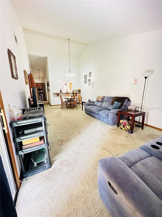 carpeted living room featuring vaulted ceiling