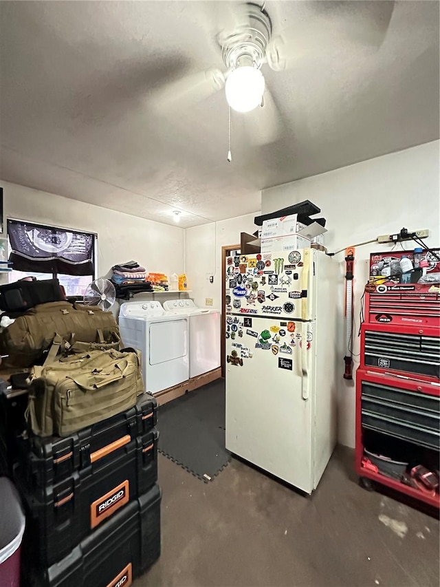 kitchen with white refrigerator and washing machine and clothes dryer