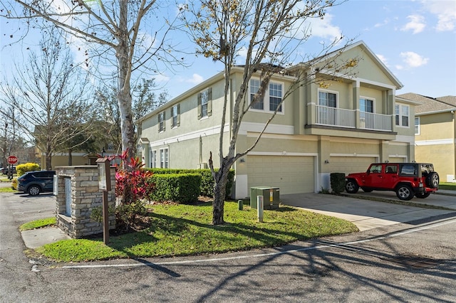 multi unit property with a garage and cooling unit