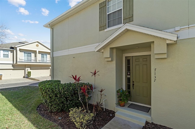 property entrance with a garage