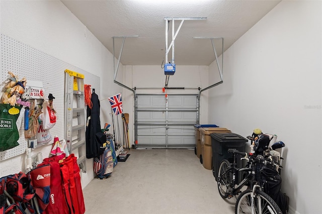 garage featuring a garage door opener