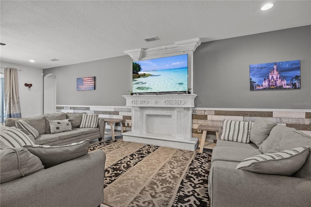 living room featuring a textured ceiling